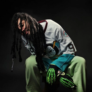 Artist cover Travie McCoy